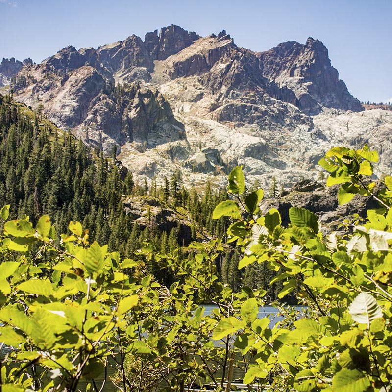 Sardine Lake — dramatic Sierra Nevada granite peaks above crystal blue alpine lake